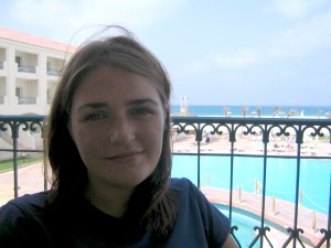 tara loder on balcony overlooking pool