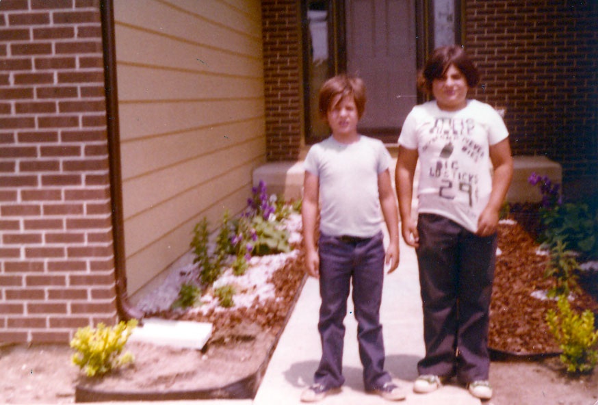 the-house cory fosco and his brother in front of their house's walkway