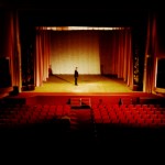 empty opera hall one man on stage