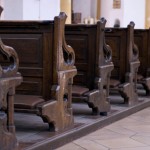 close up of old style wodden church pews