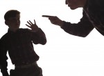 silouette of father yelling at son