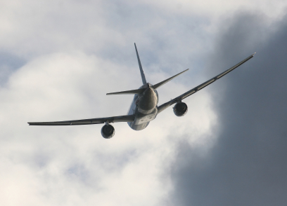 airplane entering cloudy sky