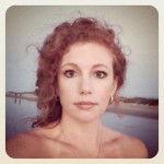 kelly flick outside with lake behind