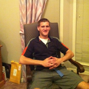 rob hanson sitting in chair