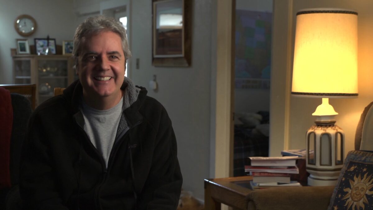 poe ballantine in room by lamp