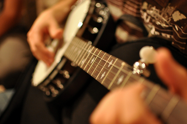 banjo playing close-up shot