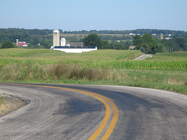 rural ohio road, curve with farm in backgroud