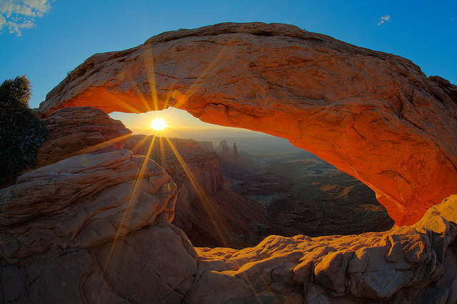 sunrise at canyonlands park through mesa arch