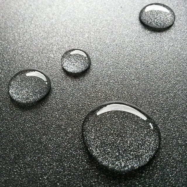 drops of oil on a nonstick pan