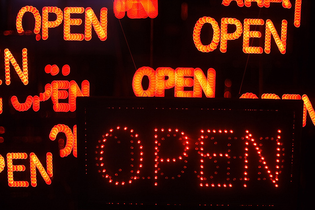 lots of neon open signs on in all different sizes