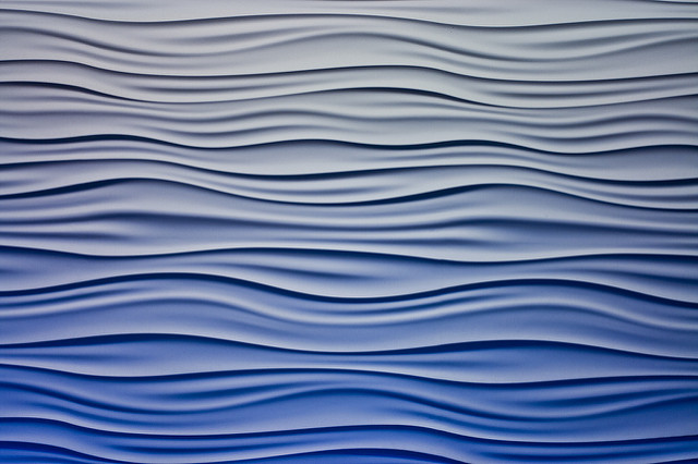 close up of pattern resembling both ocean waves and sound waves
