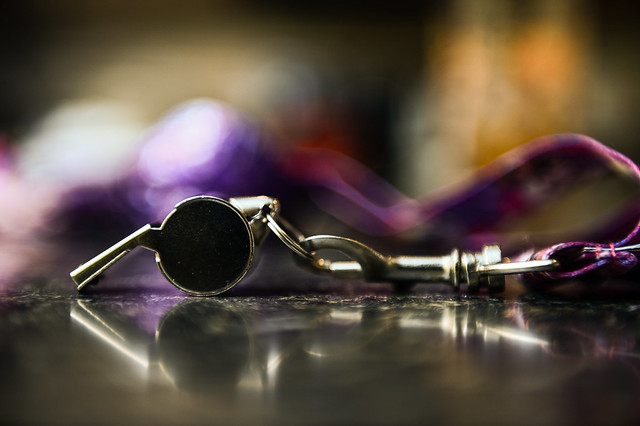 close up of a silver whistle