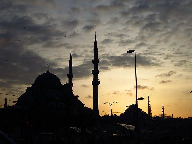 view of Istanbul at dusk, clouds and sillouettes of towers