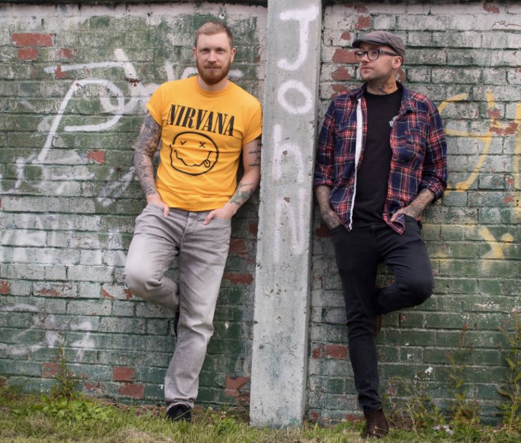 Author Aidan Martin and Illustrator Mark Deans stand side-by-side