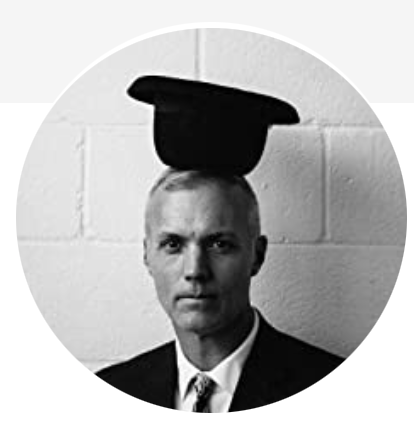 Patrick Madden with bowler hat balanced upside down on head