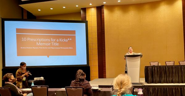 Kristen Paulson-Nguyen at podium