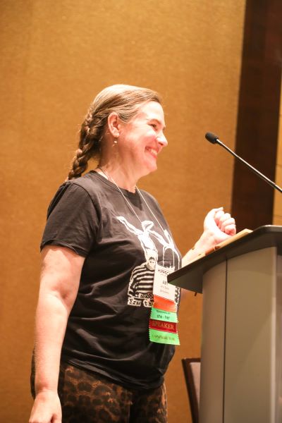 amy eaton at podium at HippoCamp 2021