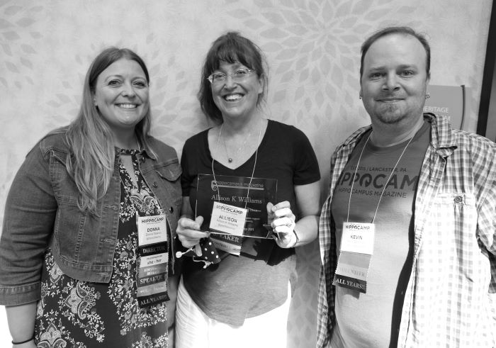 allison k williams holding award, standing between donna talarico and kevin beerman