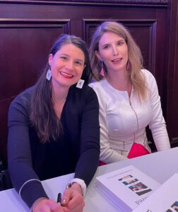 Brandi Larsen and Daniella Mestyanek Young at a book signing.