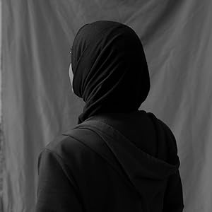 Back view of author Lamya H.