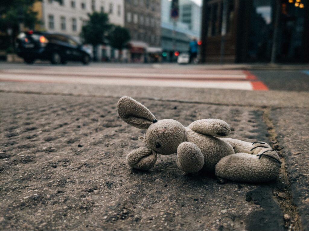 plush bunny the middle of a city street