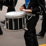 close up of snare drum player in marching band