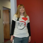 donna in shirt that says i heart sants