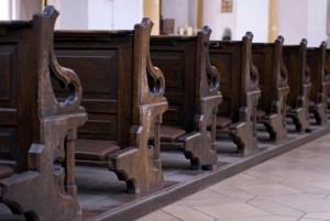 Close up of old style wodden church pews