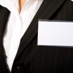 blank nametag on woman