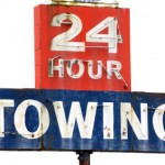 24-hour towing sign