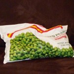 bag of frozen peas on couch