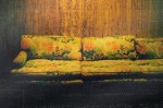 old couch with green and orange flowers