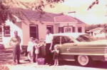 old family photo kids with daddy by car