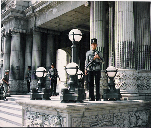 Soldiers stand guard in guatemala photo copyright john f Miglio
