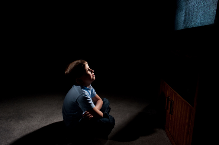 Boy in front of tv