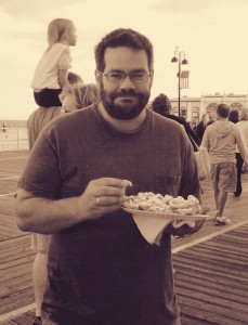 Damien galeone on boardwalk with funnel cake