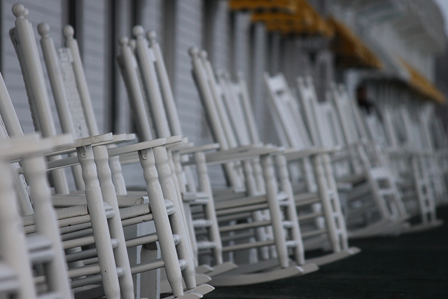 close up of empty rocking chairs on porch of grand hotel mackinac island