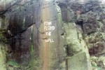 pink-floyd-the-wall-graffiti on rock ledge