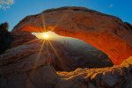 sunrise at canyonlands park through mesa arch