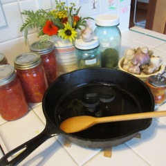 Italian sauce making ingredients and cast iron pan