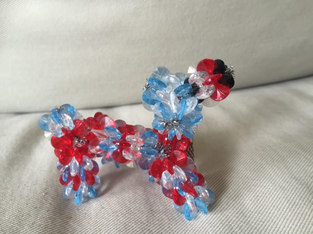 Red white and blue plastic bead keychain small animal