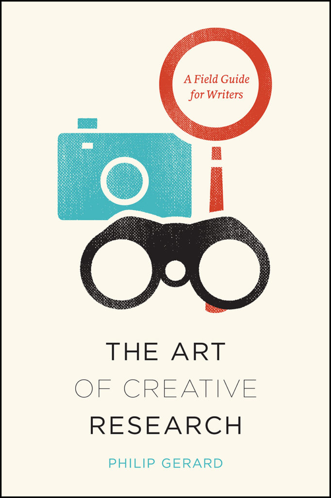 book cover with title and icons of camera and binoculars on front
