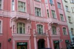 pink apartment building in prague nice architectural detail