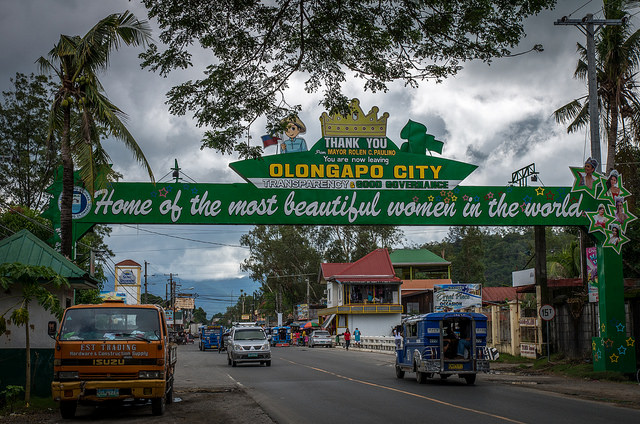 welcome sign to city that says "home of the most beautiful women"