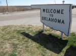 welcome to OK sign shaped like oklahoma (like a pan)