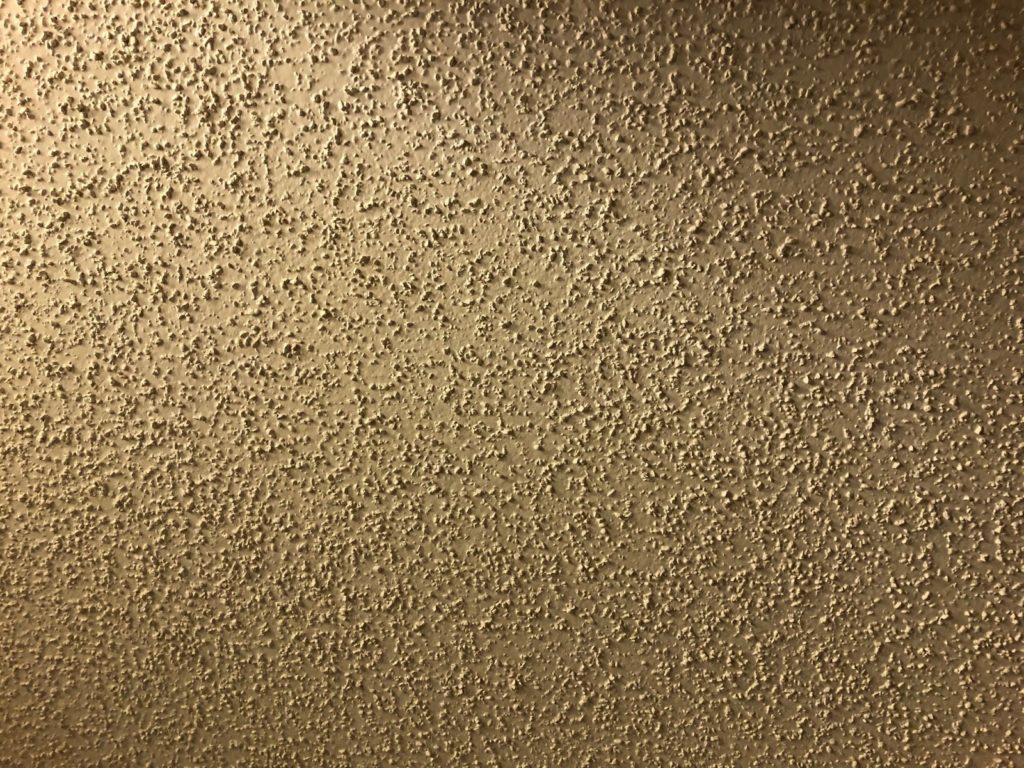 Picture looking up at popcorn ceiling