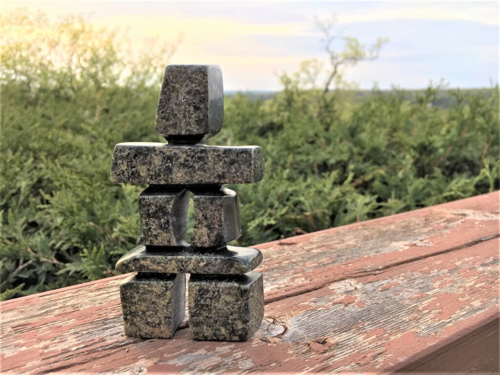 Photo of one of the Inuksuks the author found on her trip. 
