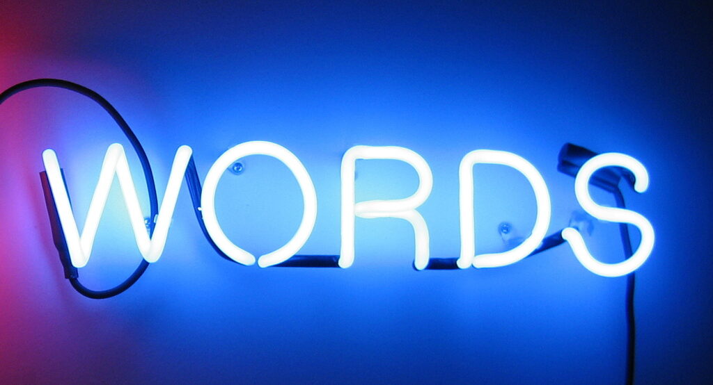 neon lights spelling out WORD