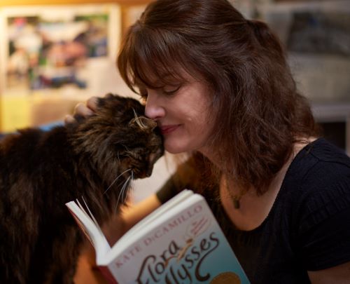 Melissa Hart with cat and book