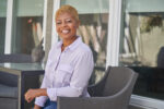 Author Nefertiti Austin sitting in chair